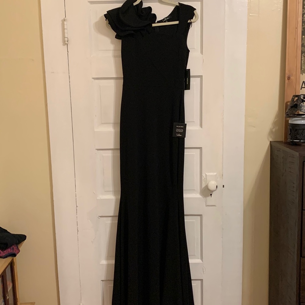 Brand new. Never worn, tags still on